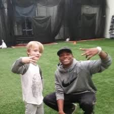 Coach Corey Stigar training a young athlete at The Pump Tank
